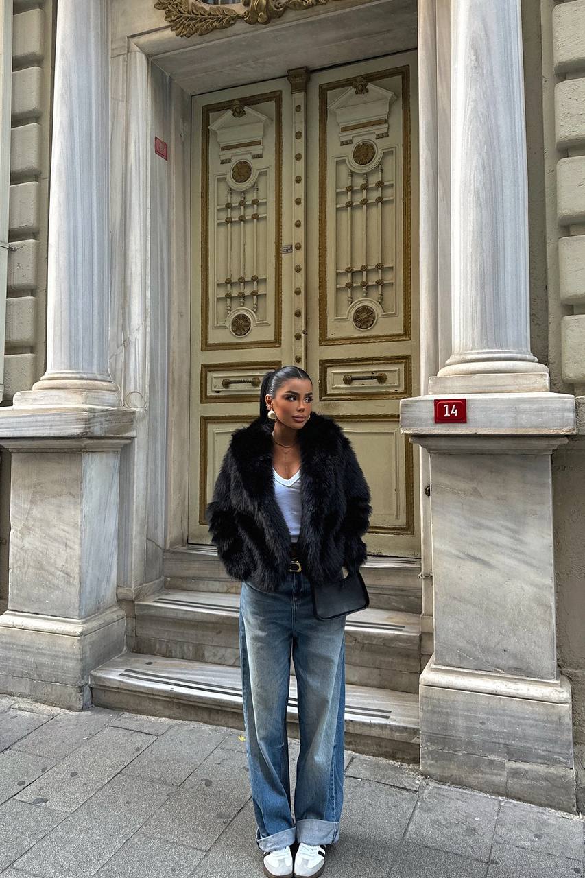 ქალის ბეწვის ქურქი