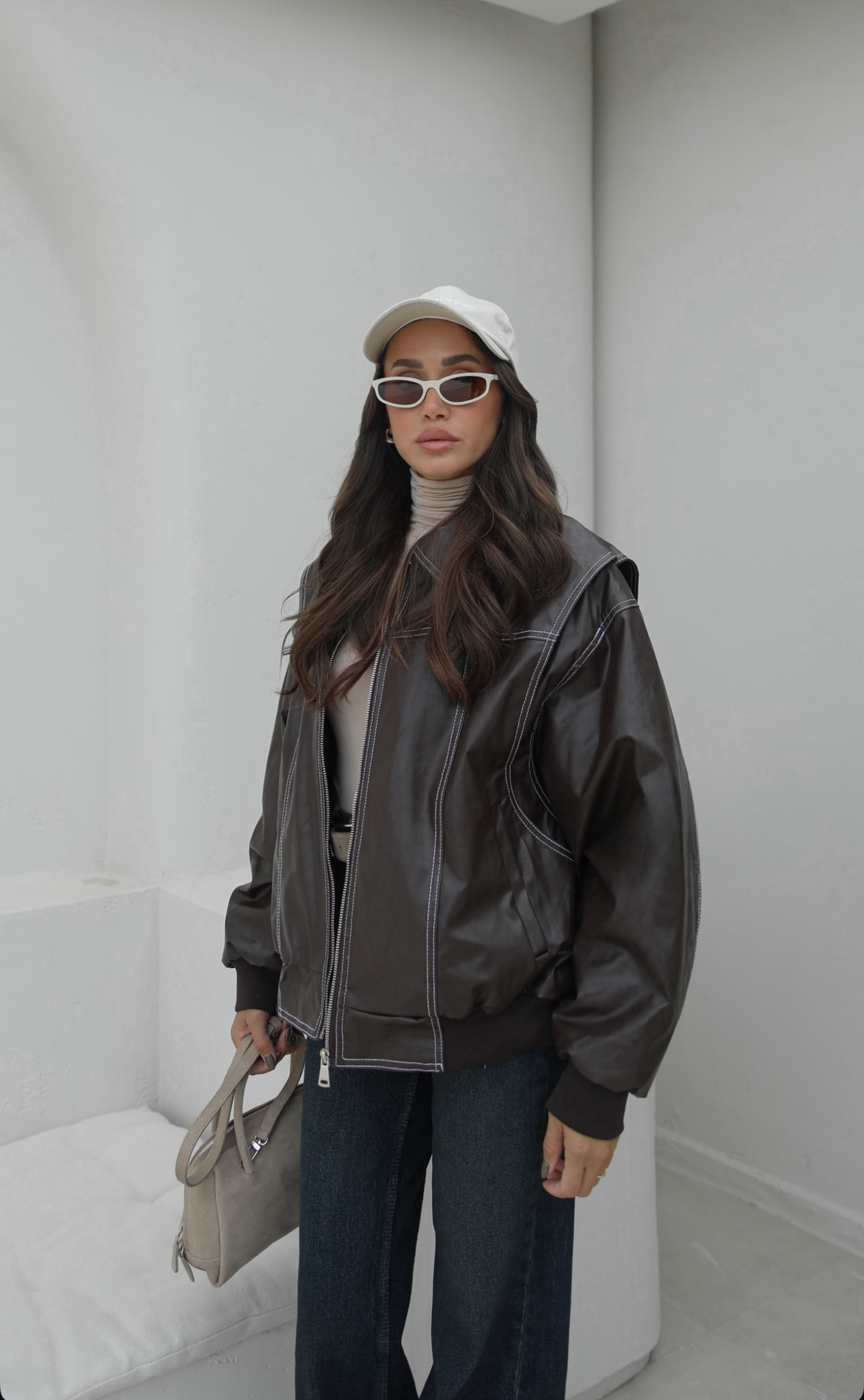 ქალის ტყავის ქურთუკი