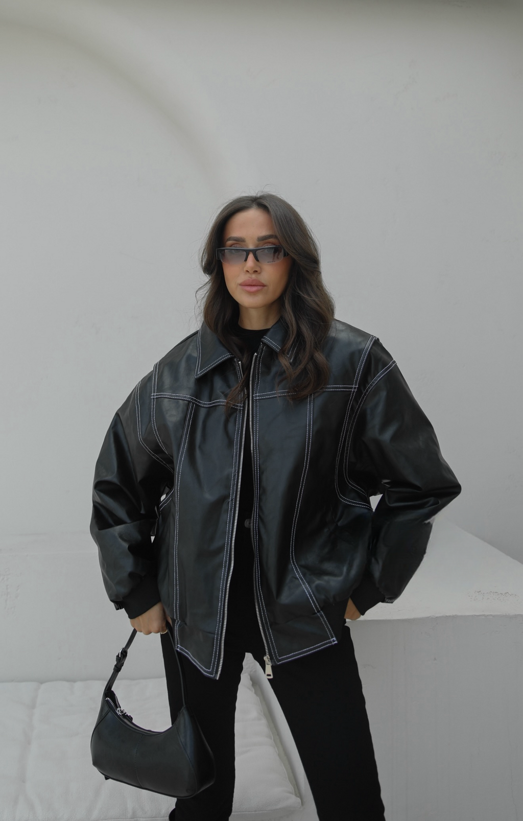 ქალის ტყავის ქურთუკი