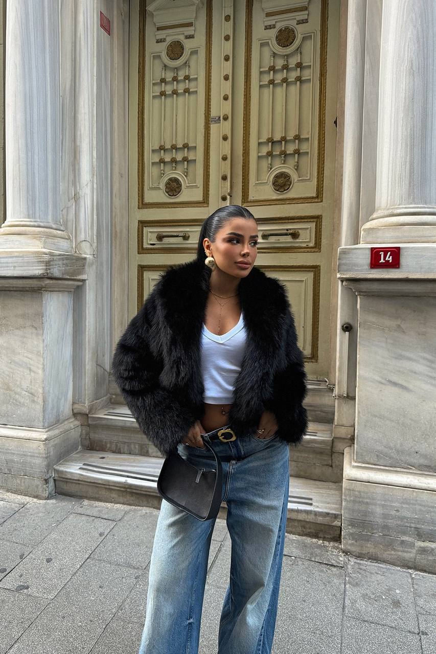 ქალის ბეწვის ქურქი